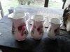 Set of three antique rose jugs